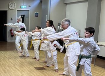 Students practing kong chee - strikes